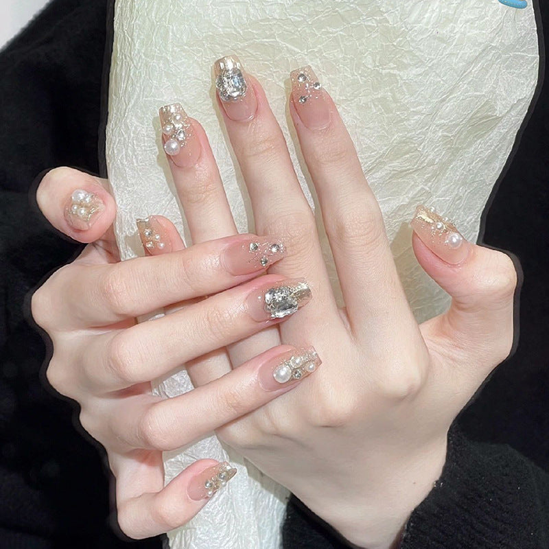 Artificial nail set with elegant pearl and glitter design Stornfield