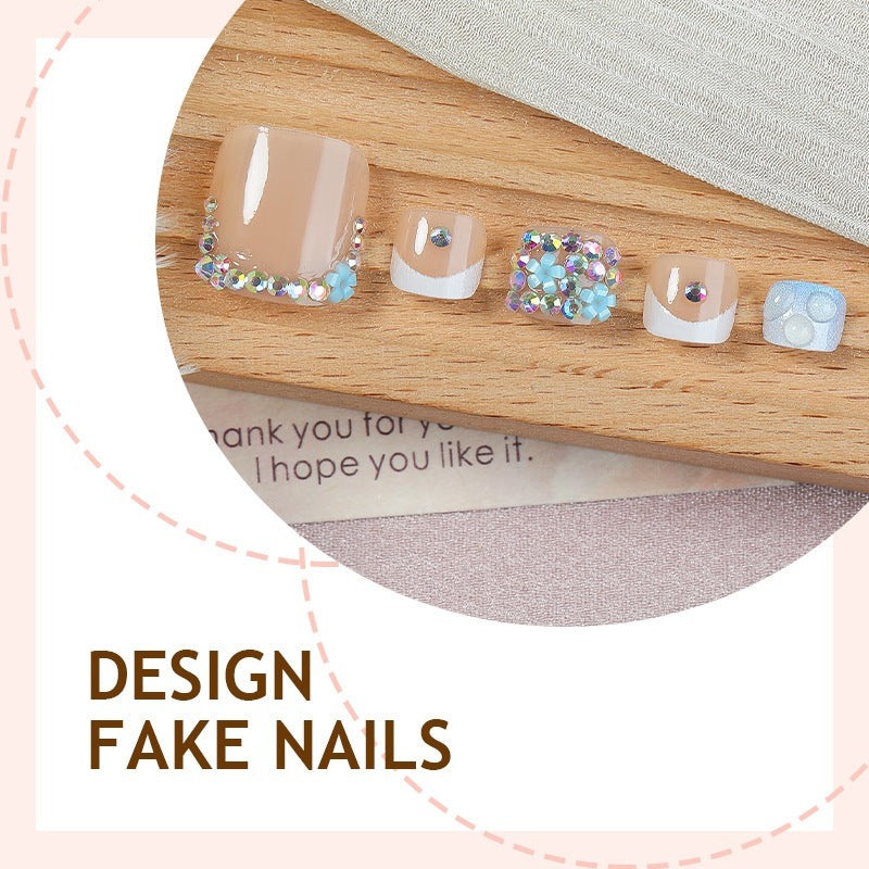 Glamorous artificial nail creation with elegant embellishments Stornfield