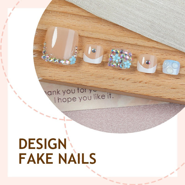 Glamorous artificial nail creation with elegant embellishments Stornfield
