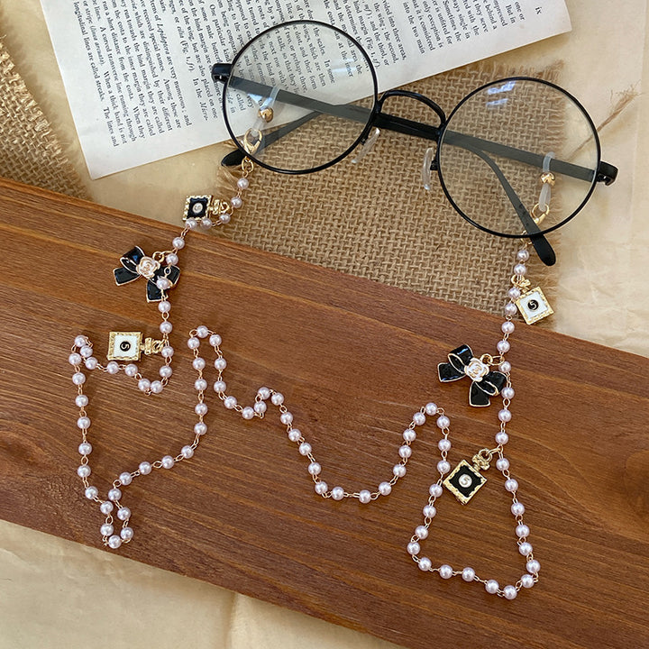 Fashionable glasses holder chain with pearls and pendants Stornfield