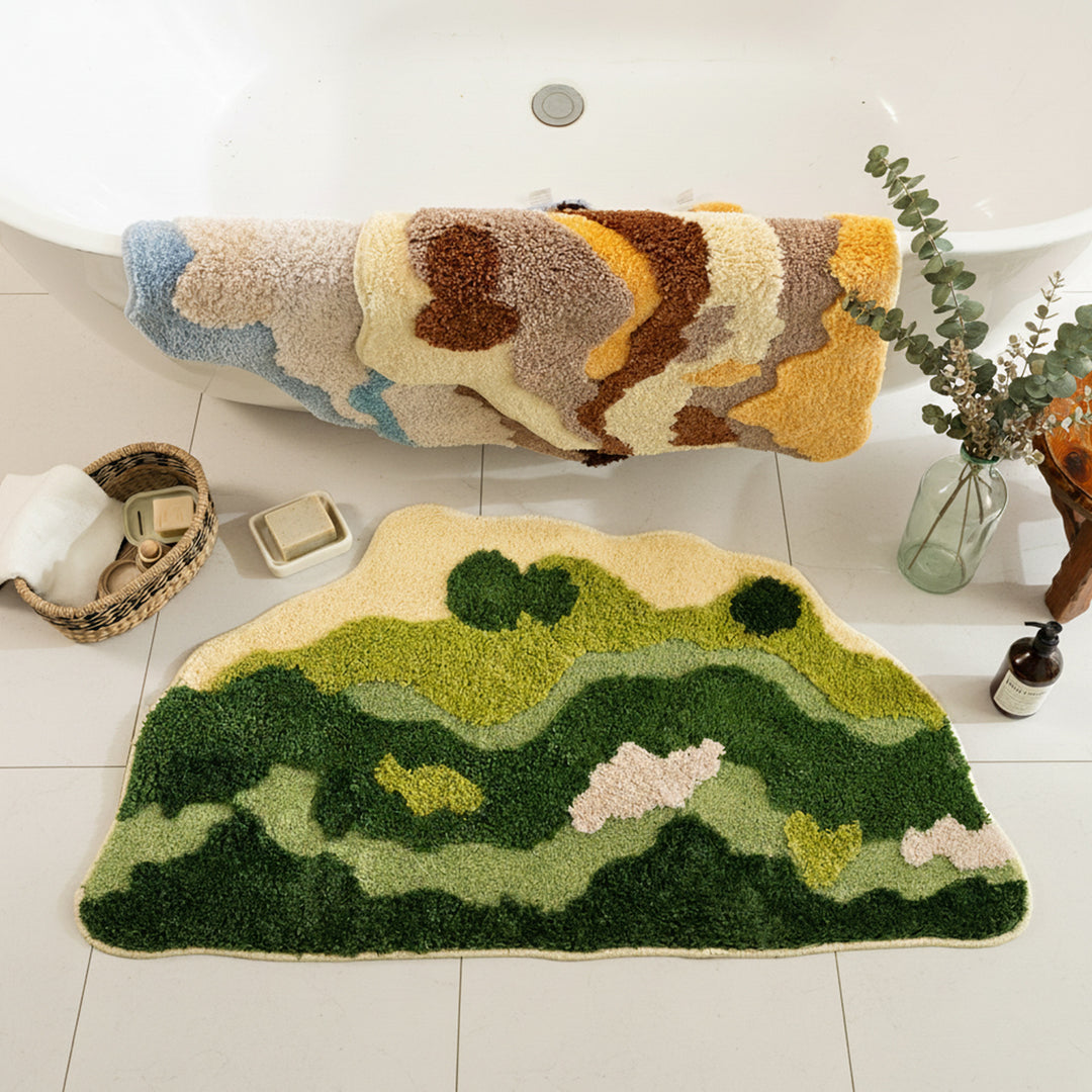 Shaped hand-tufted living room rug with moss-like structure and relief optics Stornfield