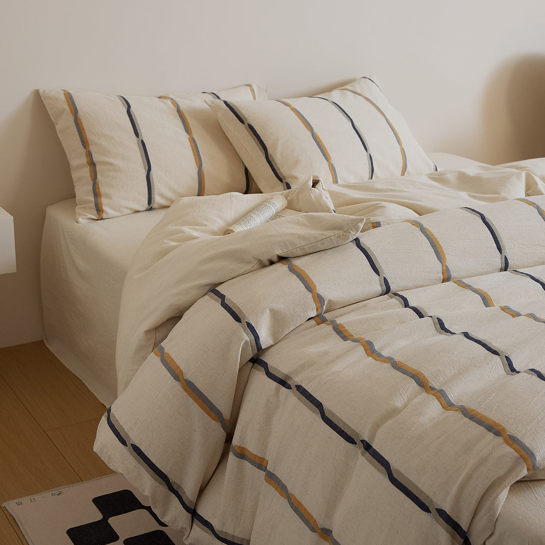 Cotton-linen duvet cover set with brush stroke stripes and airy muslin texture