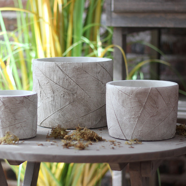 Decorative plant container made of handmade ceramic with leaf pattern Stornfield