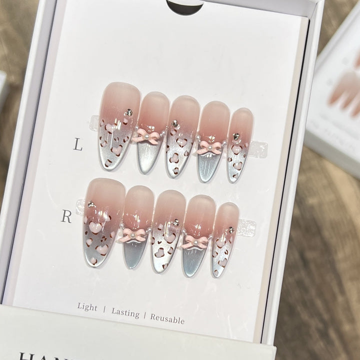 Decorative Press-On Nail Design with Bow Accents Stornfield