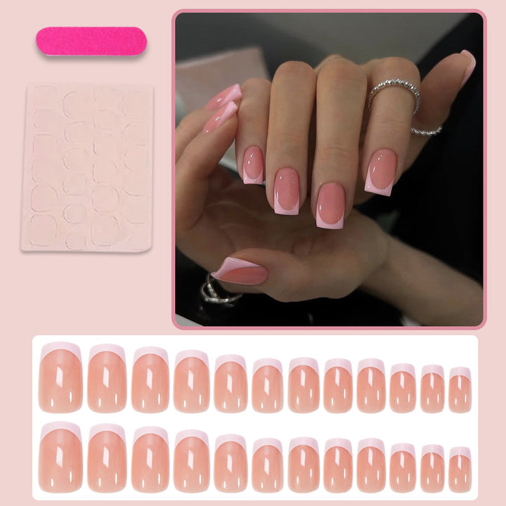 Nail set with elegant French tip and sparkling accents Stornfield