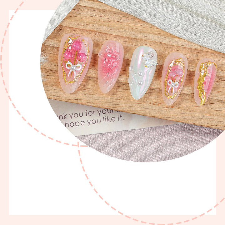 Art nail set with sparkling flowers and decadent accents Stornfield