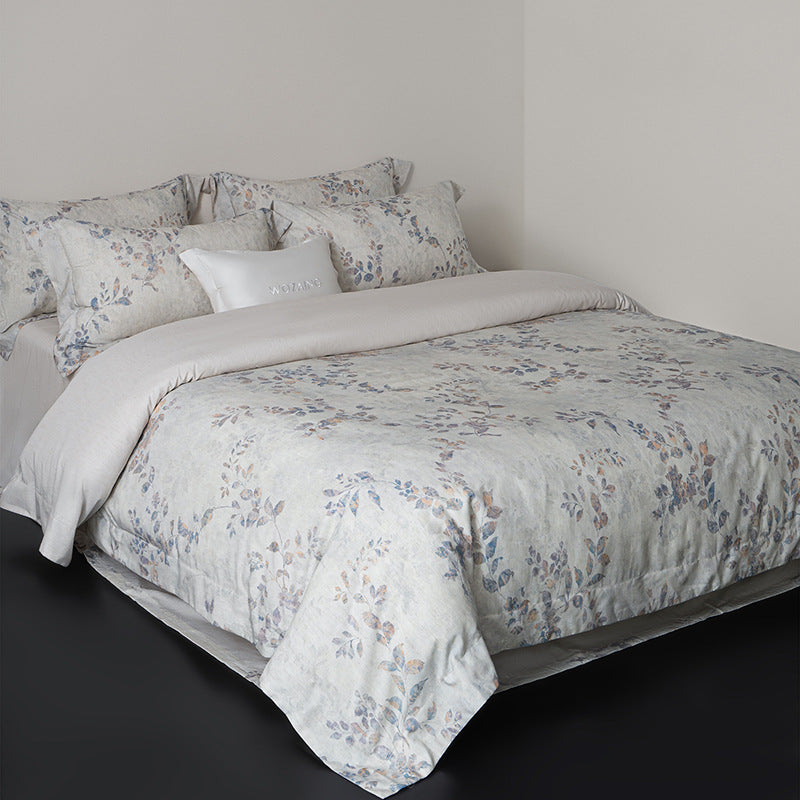 Linen-look cotton duvet cover set with delicate watercolor flower pattern and reversible function