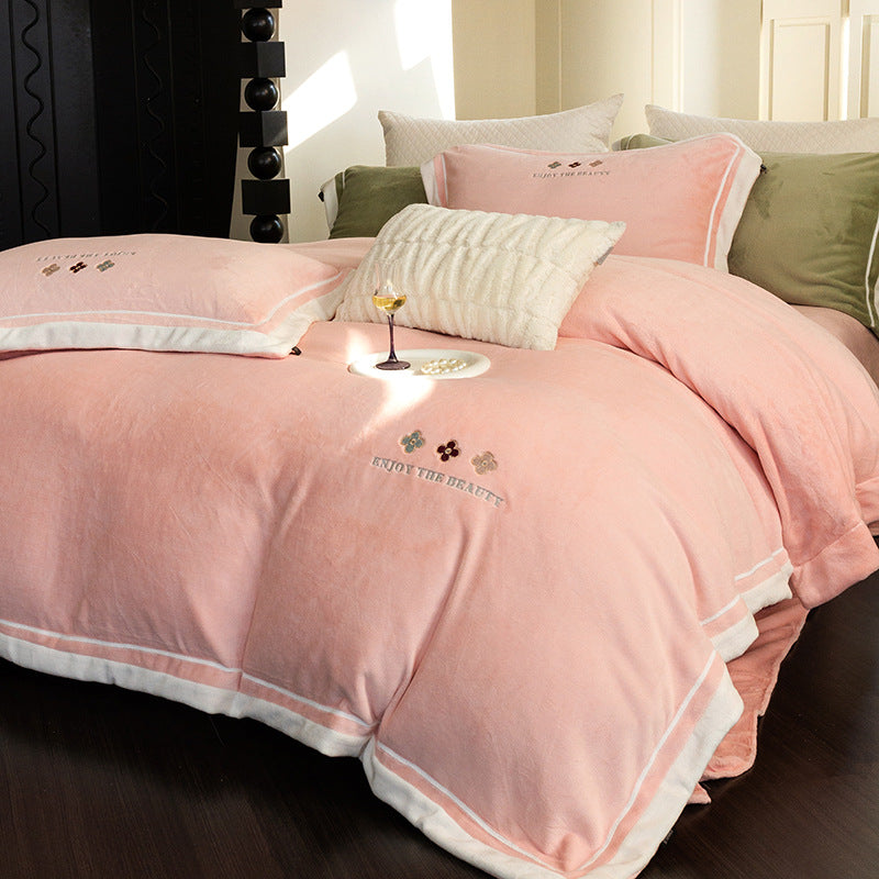 Velvety duvet cover set with embroidered floral design and contrasting piping