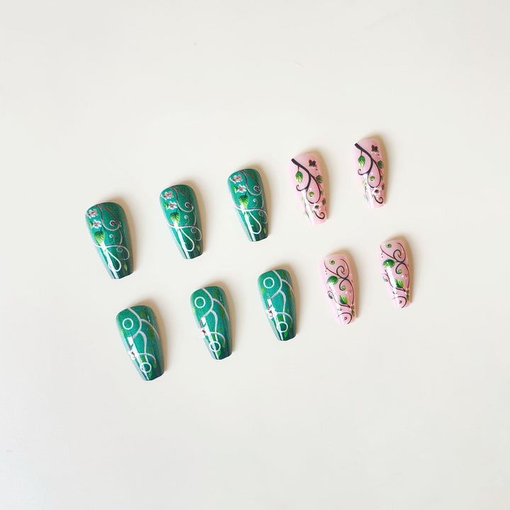 luxurious artificial nail set with floral designs and detailed accents Stornfield