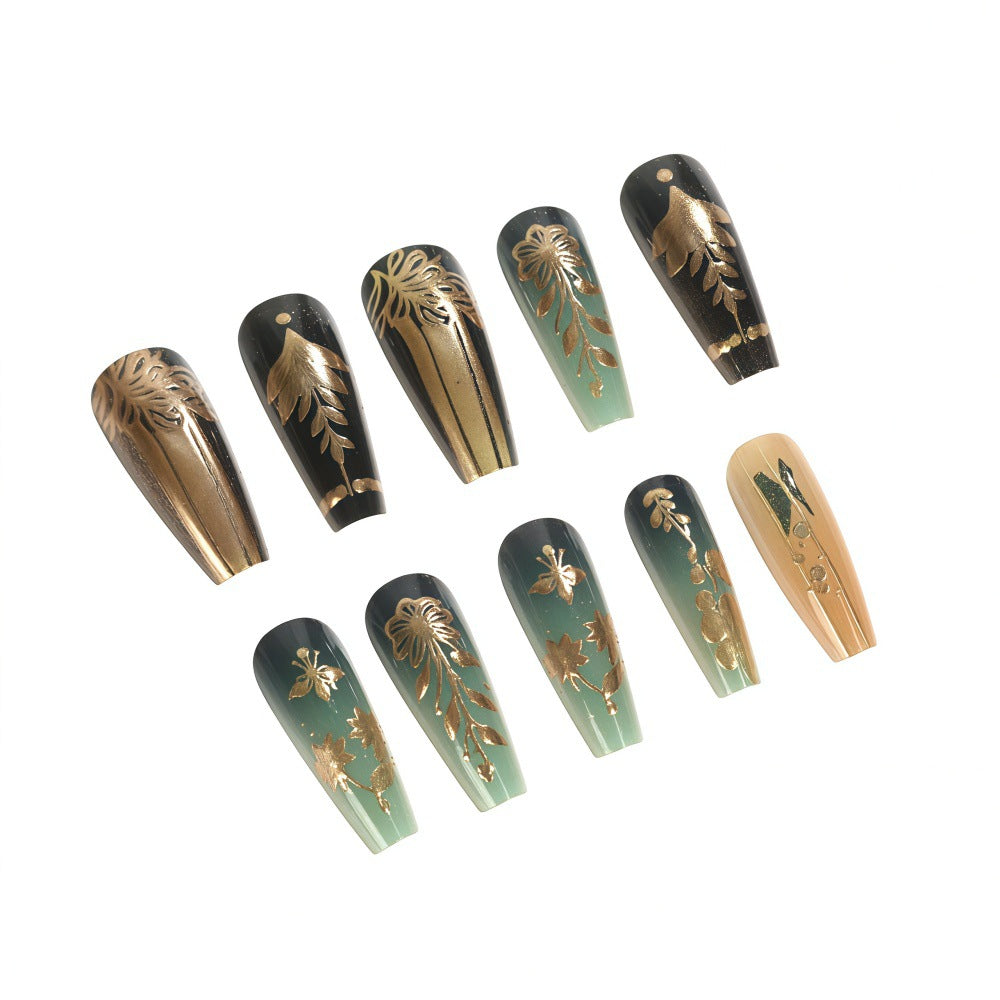 Artificial nails with floral gold embellishments Stornfield