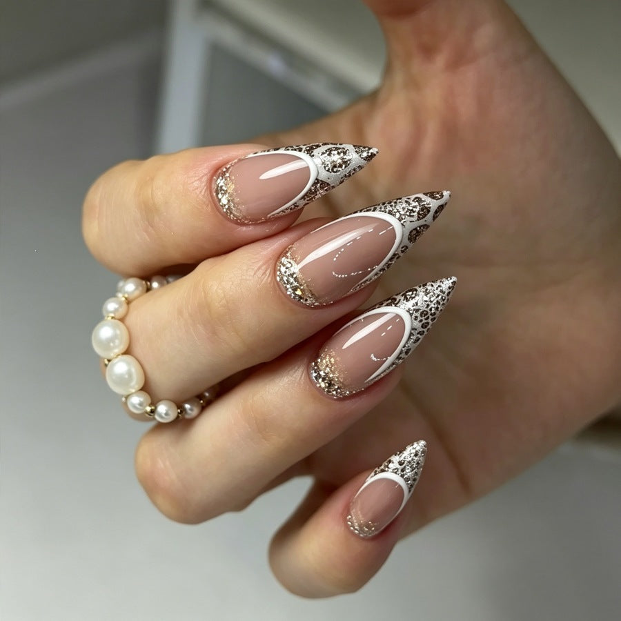 Exquisite artificial nail creation with glitter and unique design Stornfield