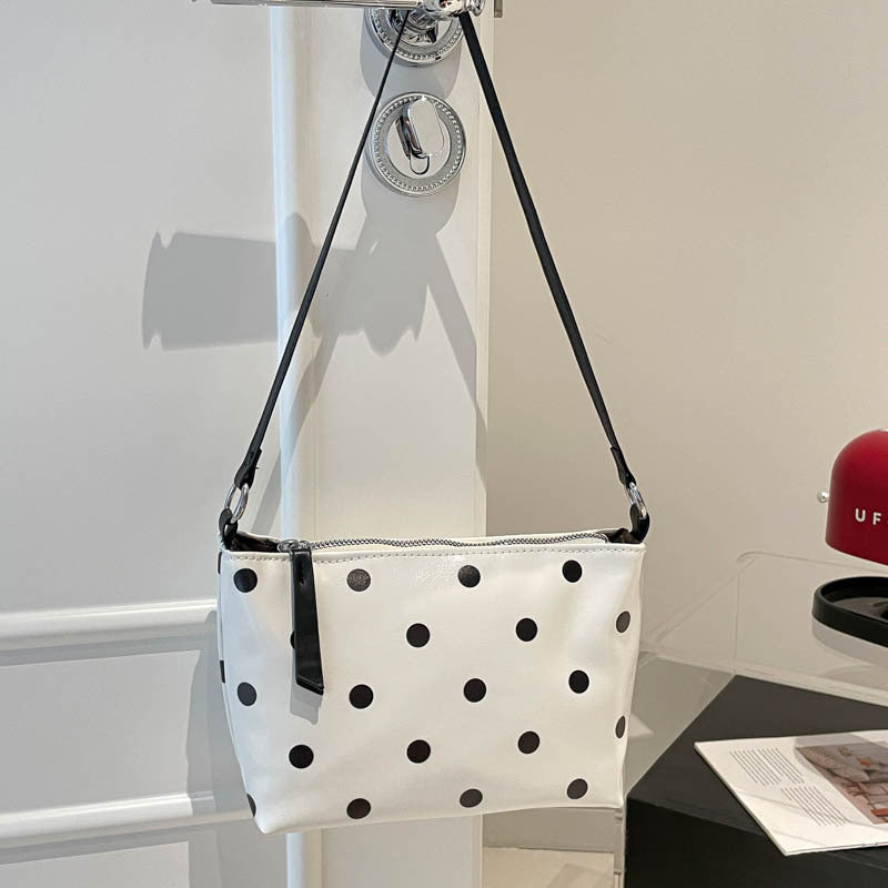 Sleek Polka Dot Handheld Clutch