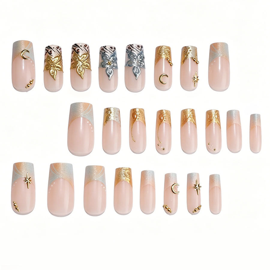 Luxurious artificial nail set with creative floral design and golden accents Stornfield