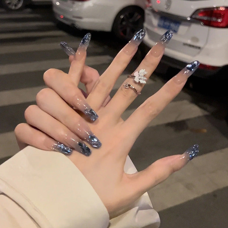 Artificial nails with heart design and glitter accents Stornfield