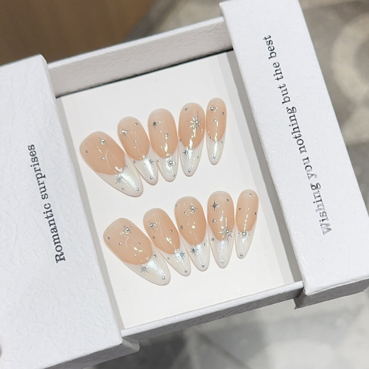 Glamorous artificial nails with romantic star pattern Stornfield