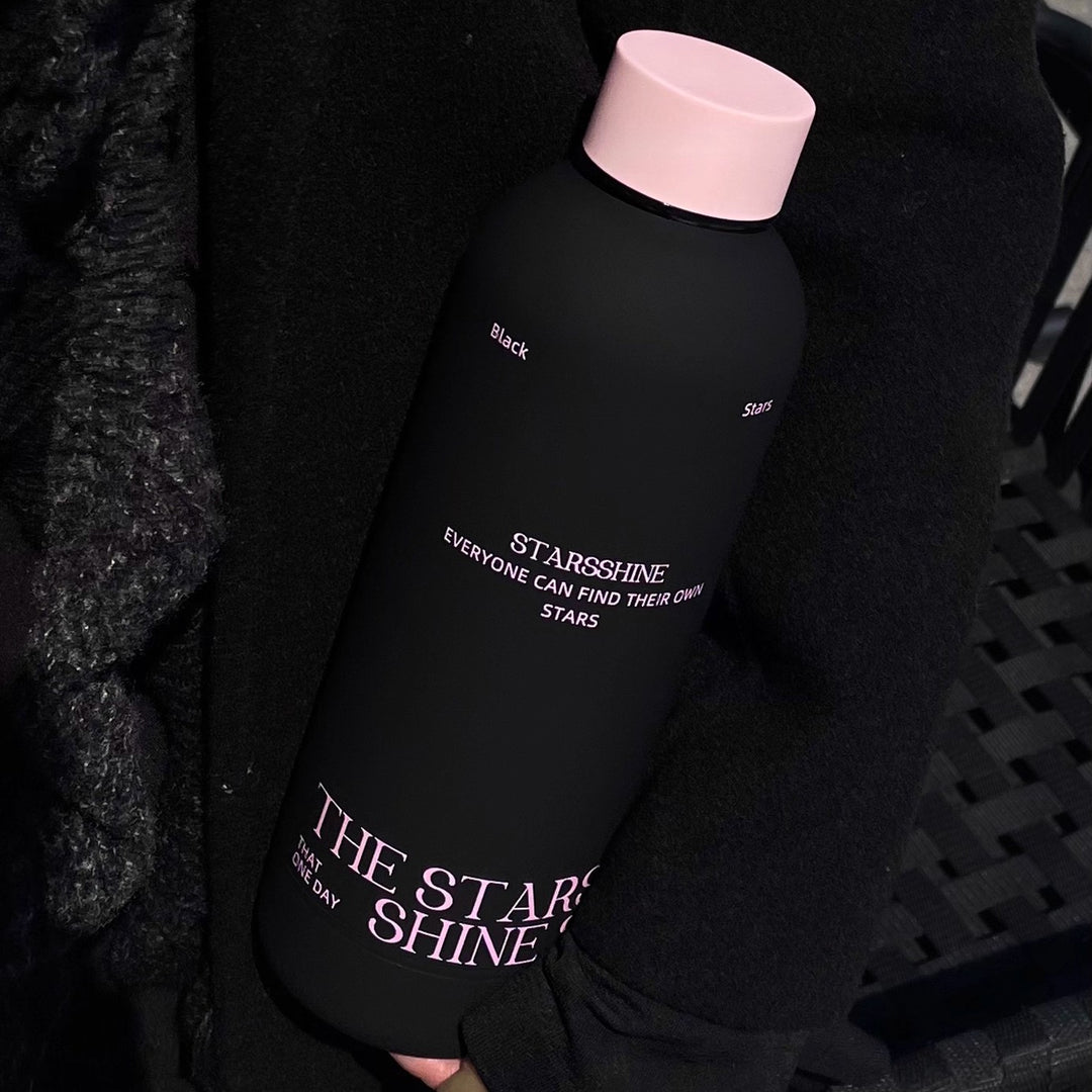Women's insulated bottle with ergonomic design and practical carrying strap Stornfield