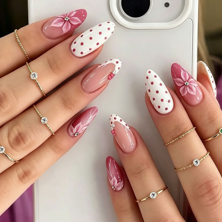 Artificial nail set with floral accents and charming polka dots Stornfield