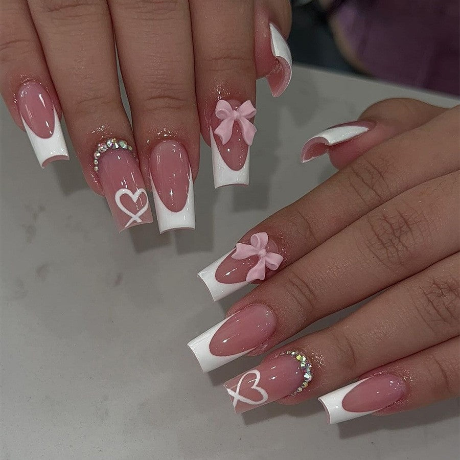 Artificial nail set with delicate bow and leopard patterns Stornfield