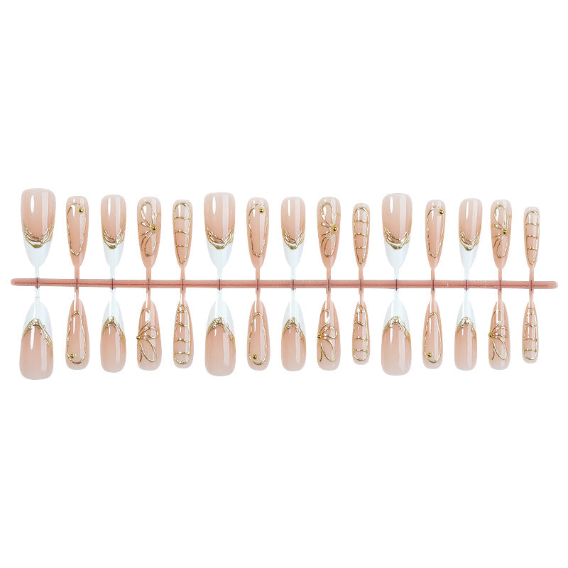 Artificial nail set with elegant floral golden accent Stornfield