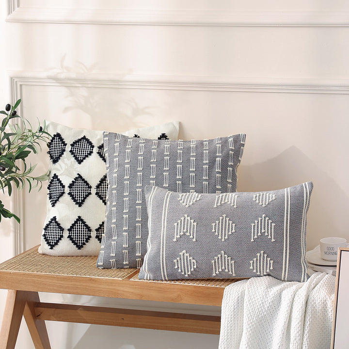 Woven rectangular decorative cushion cover with embroidered geometric pattern
