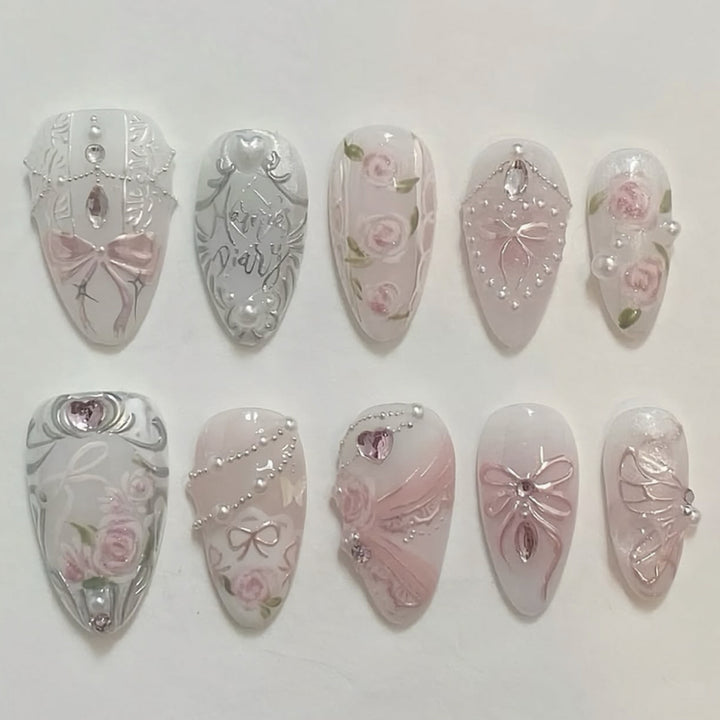 Artistic nail extensions with elegant flower decoration Stornfield