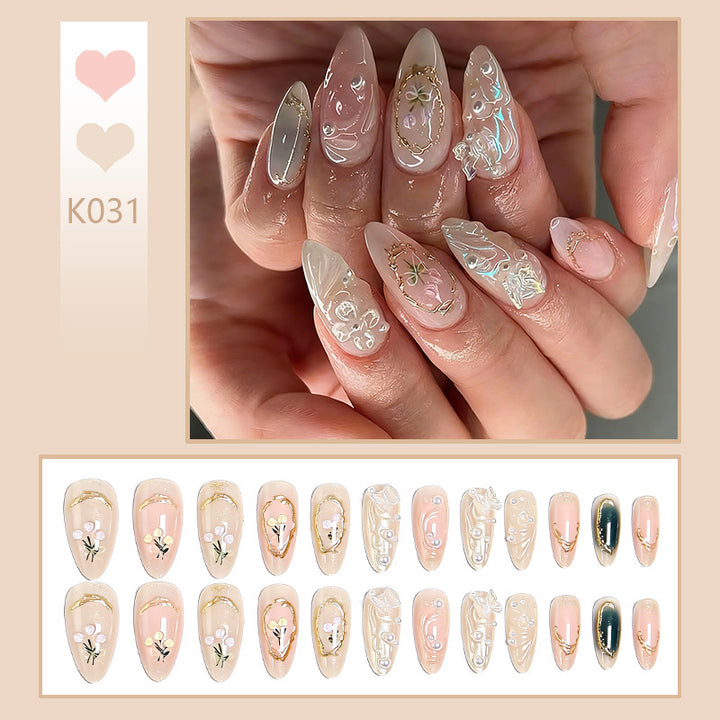Elegant artificial nails with holographic and floral decorations Stornfield