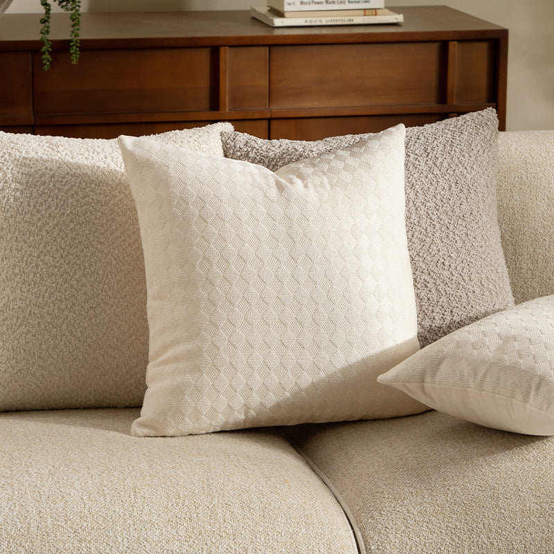 Square decorative pillow with woven triangle structure and removable cover