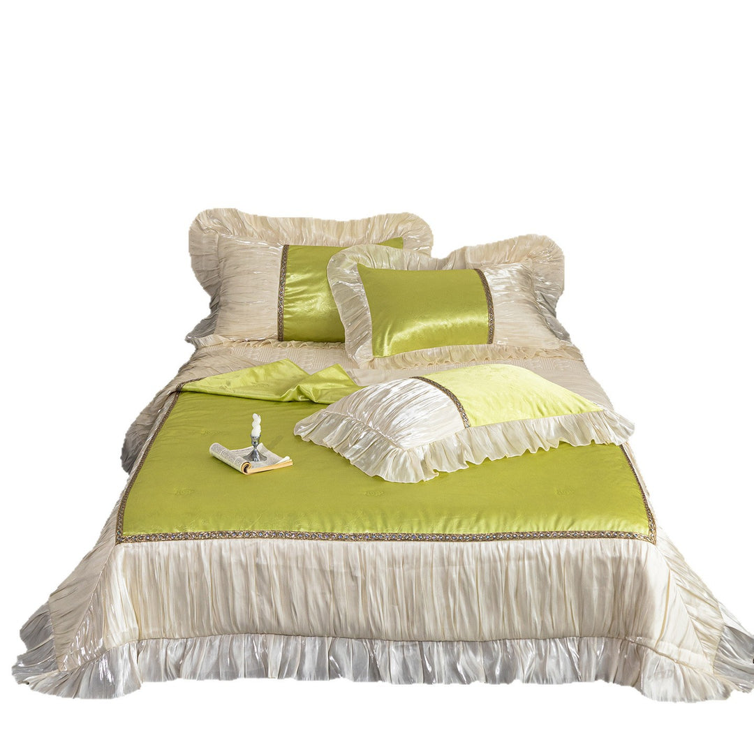Opulent ruffled bedspread and pillow set made of satin with decorative border