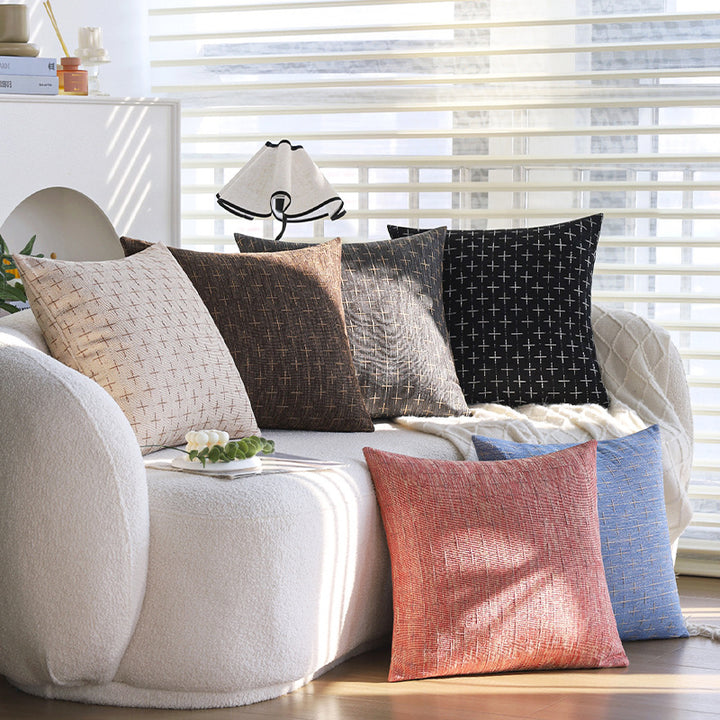 Square cushion cover in Scandinavian minimal style with woven cross pattern and natural linen look Stornfield