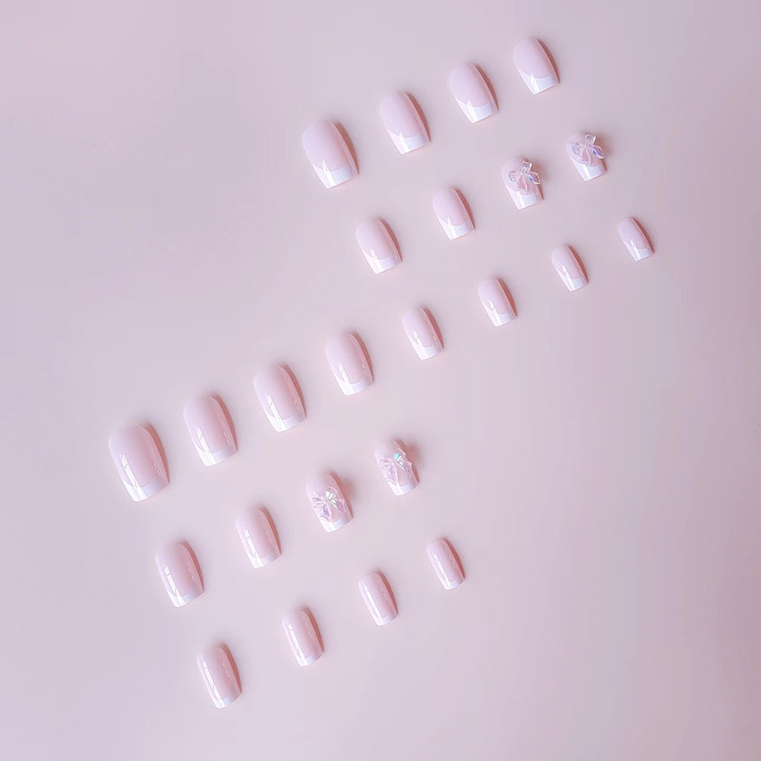 Acrylic nail set with elegant French tips and 3D details Stornfield