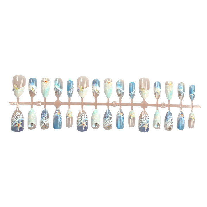 Artificial nails with maritime shell pattern Stornfield