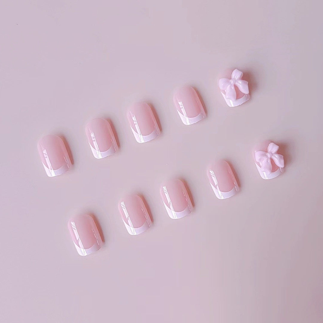 Acrylic Nail Set with Elegant Tips and 3D Bow Decorations Stornfield