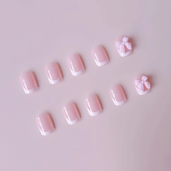 Acrylic Nail Set with Elegant Tips and 3D Bow Decorations Stornfield