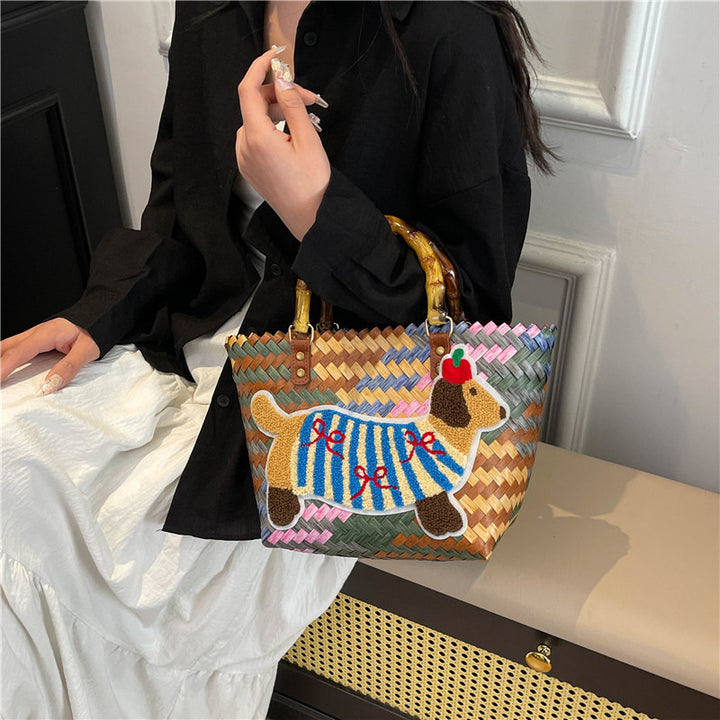 Shoulder bag with playful dog motif Stornfield