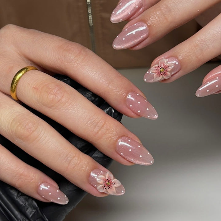 Artificial nail set with glitter and delicate floral and rhinestone embellishments Stornfield