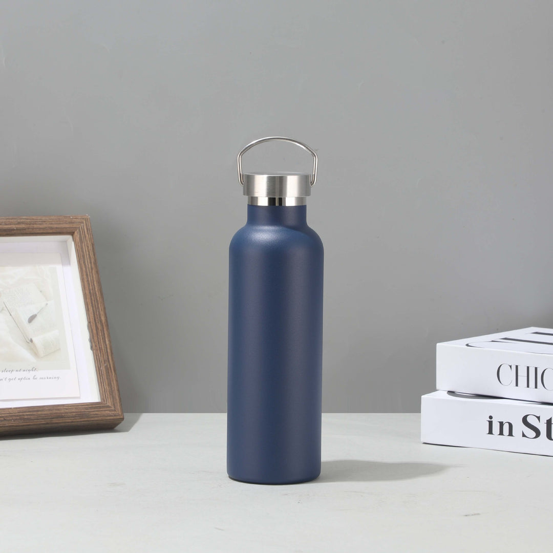 Women's stainless steel insulated drinking bottle with sustainable bamboo lid Stornfield