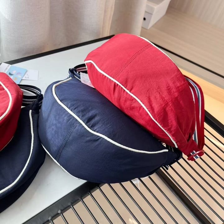 Shoulder bag with adjustable shoulder strap and versatile interior compartment Stornfield