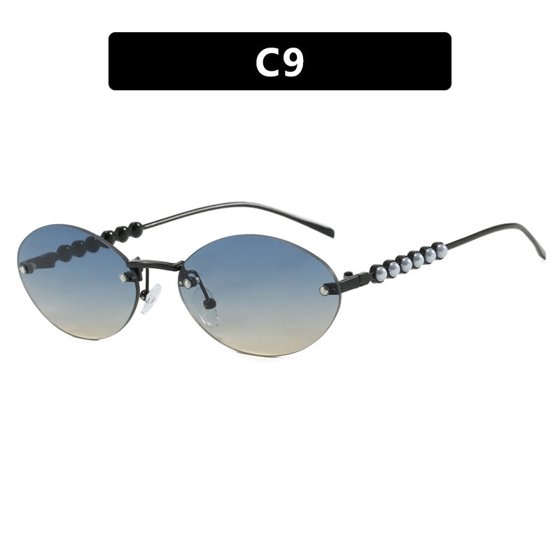 Women's stylish oval sunglasses with elegant embellishments Stornfield