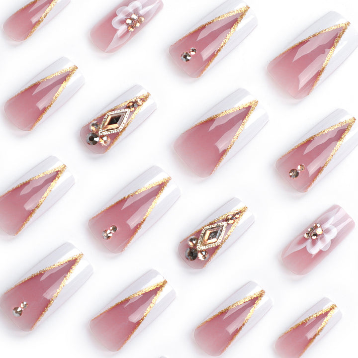 Artistic nail extensions with floral and glitter accents Stornfield