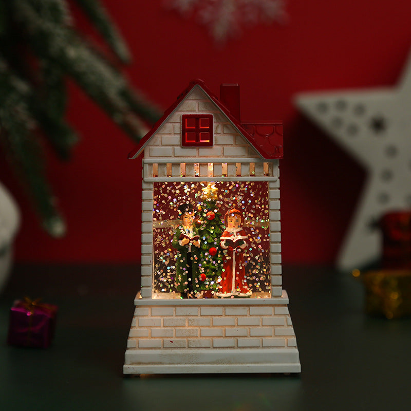 Illuminated Christmas village with moving figures Stornfield