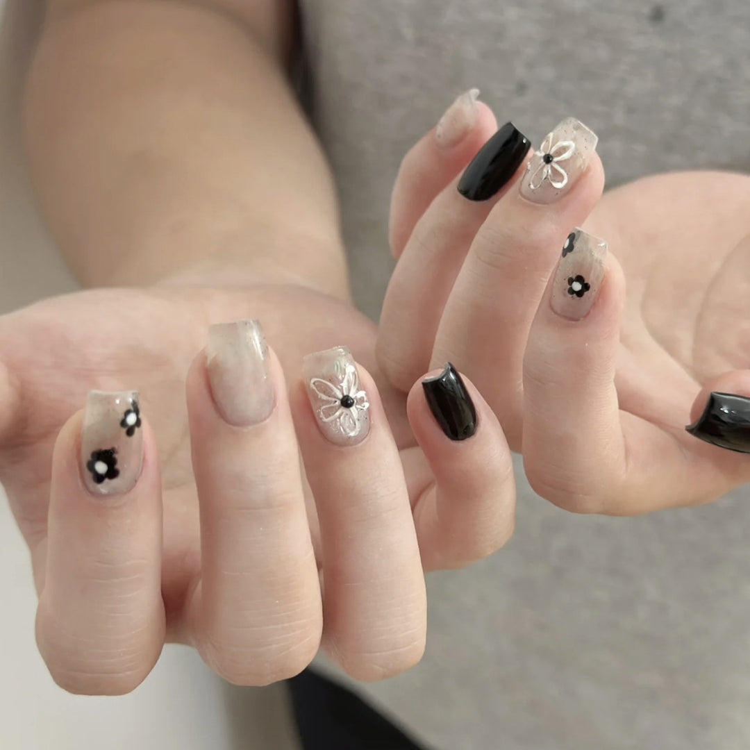 Artistic Press-On Nail Set with Floral and Speckled Design Stornfield