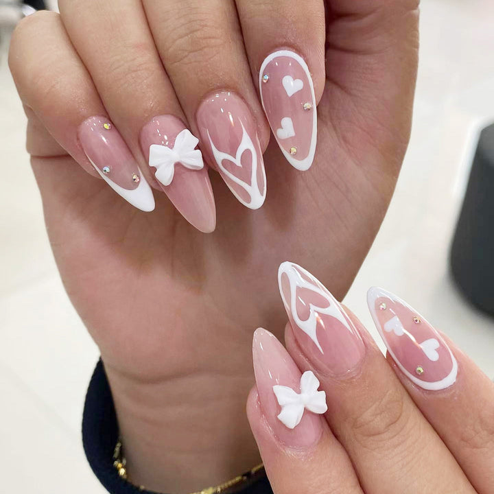 Artistic stiletto nails with heart design Stornfield