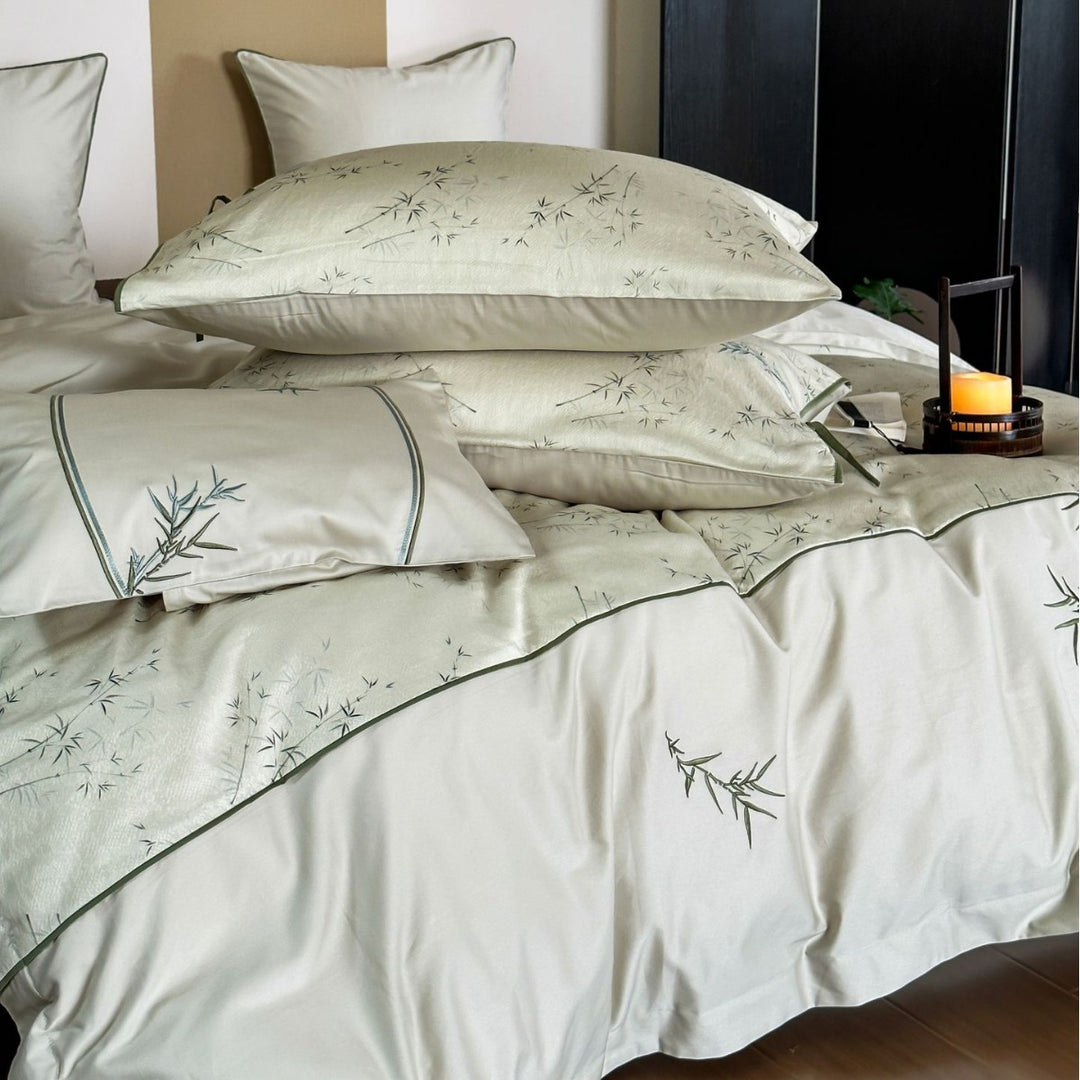 High-quality cotton satin bedding with subtle bamboo motif and piping
