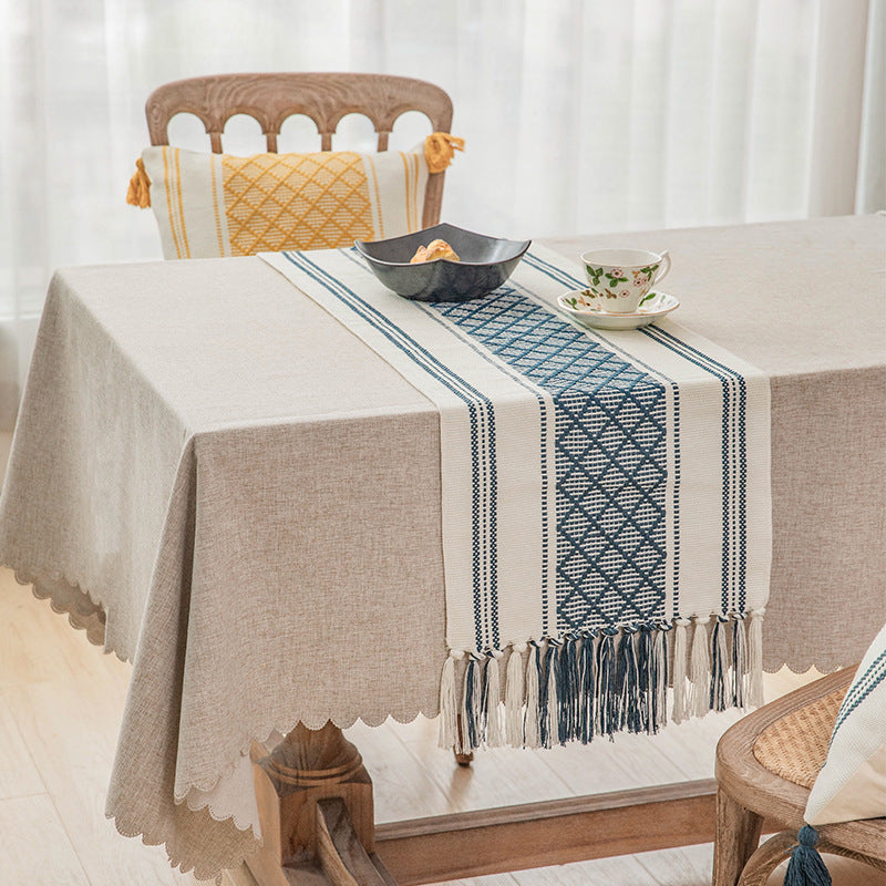 Handwoven cotton table runner with ethnic diamond pattern and fringes Stornfield