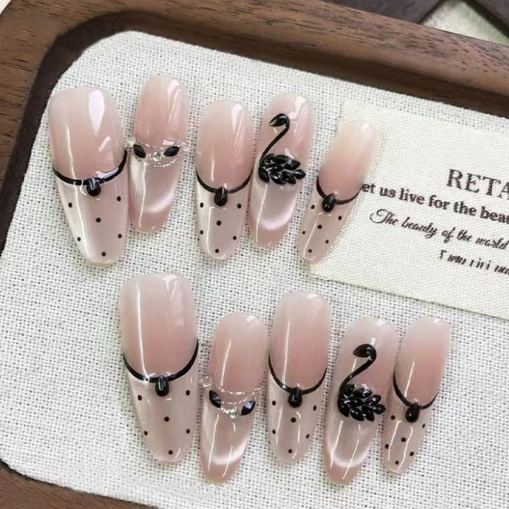Artificial nails with floral accents and elegant shine Stornfield