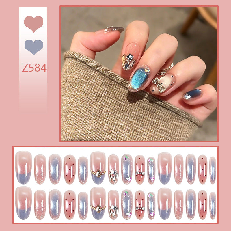 Art nails in elegant premium design with rhinestone and glitter elements Stornfield