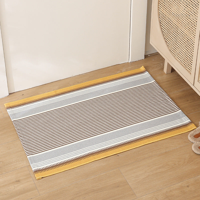 Flat striped carpet runner made of cotton blend with anti-slip coating and easy-care woven structure
