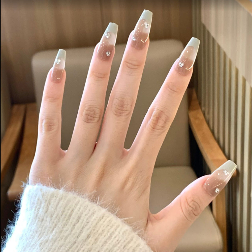 Artistic Press-On Nail Set with Floral and Gemstone Accents Stornfield