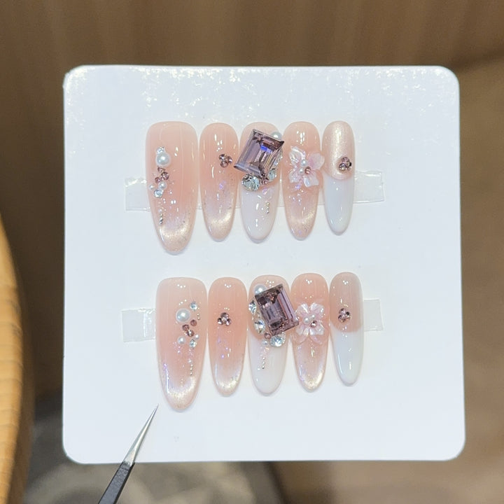 Artificial nails with elegant jewelry details Stornfield