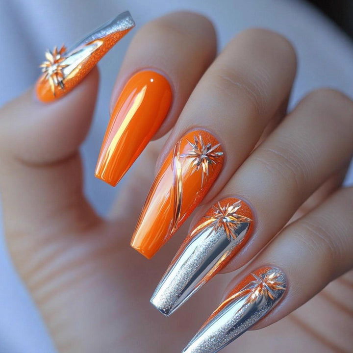 Artificial nails with glamorous metallic and floral accents Stornfield